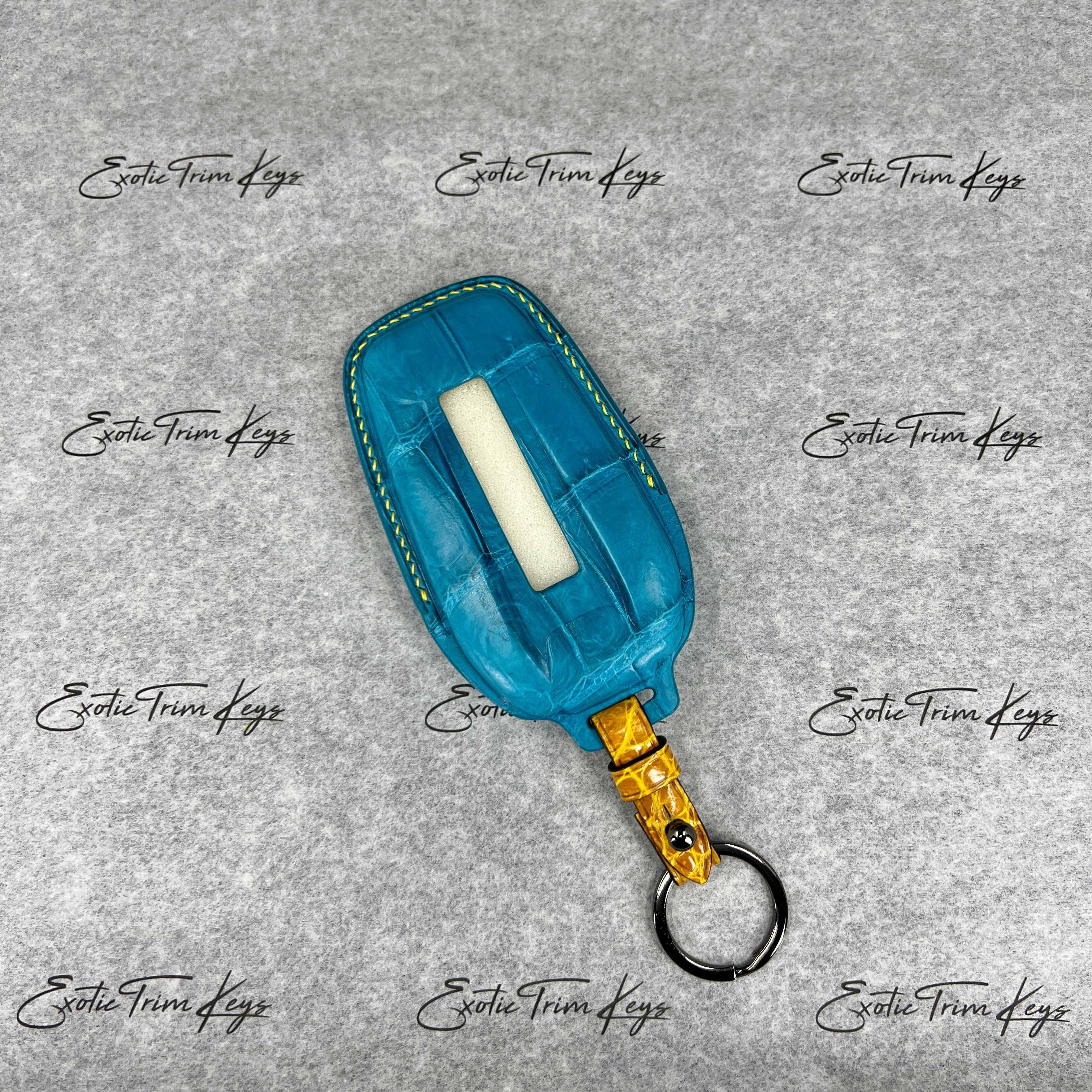IN STOCK: AQUA BLUE CROCODILE WITH YELLOW DETAILS KEY COVER FOR FERRARI