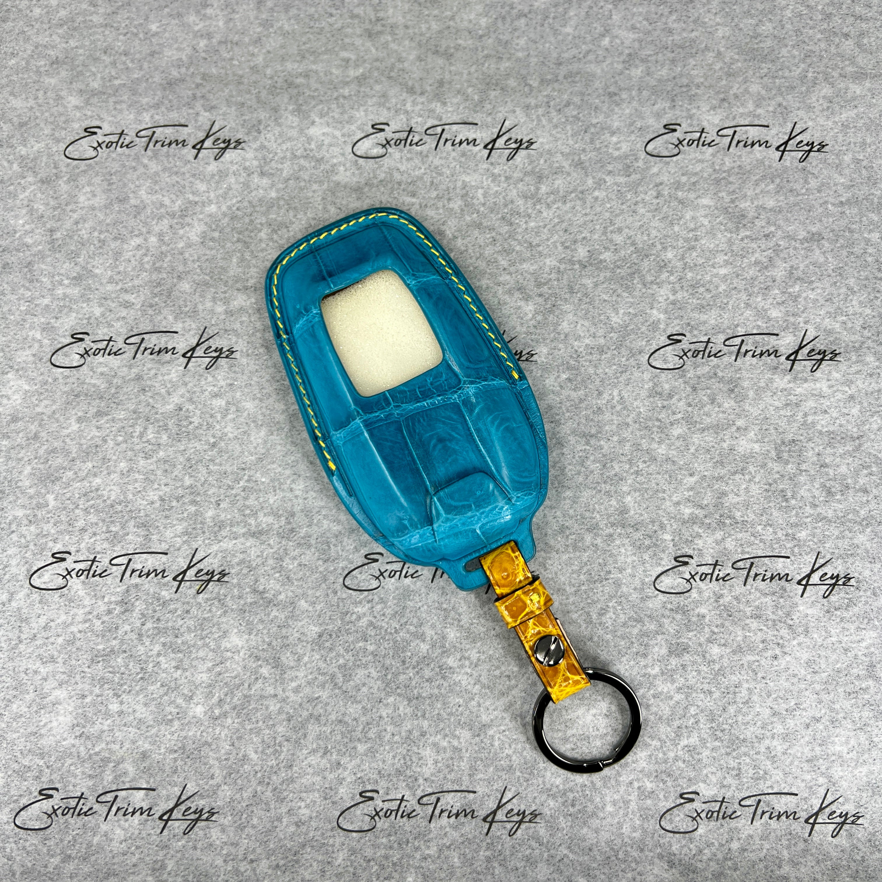 IN STOCK: AQUA BLUE CROCODILE WITH YELLOW DETAILS KEY COVER FOR FERRARI